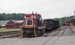 EBT m-7 leads the excursion consist through the yard in Rockhill